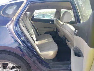 2017 Kia Optima LX with VIN 5XXGT4L35HG174613, listed as a IAAI auction lot 42097790 with 243,335 mi miles. Bid and sale history available at carsss.com. Image 8.