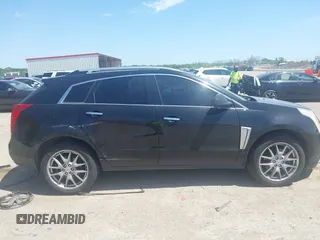2013 Cadillac SRX Premium Collection with VIN 3GYFNJE33DS560639, listed as a IAAI auction lot 42015863 with 161,270 mi miles and . Bid and sale history available at DreamBid. Image 13.