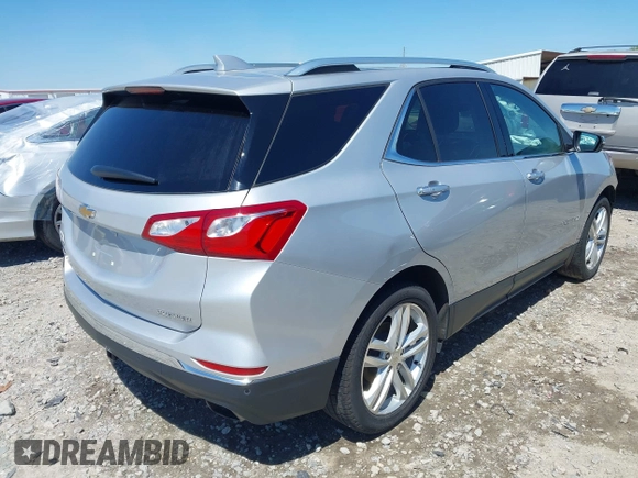 2019 Chevrolet Equinox Premier with VIN 2GNAXPEX7K6251937, listed as a IAAI auction lot 41999362 with 124,207 mi miles and . Bid and sale history available at DreamBid. Image 4.