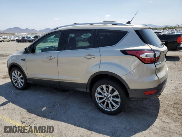2018 Ford Escape Titanium with VIN 1FMCU9J91JUB44813, listed as a Copart auction lot 59920265 with 63,008 mi miles and Salvage title. Bid and sale history available at DreamBid. Image 2.