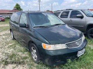 2000 Honda Odyssey EX z VIN 2HKRL1864YH613461, wystawiony jako IAAI lot #42312699 z przebiegiem 240 891 mil mil oraz . Historia ofert i sprzedaży dostępna na DreamBid. Obrazek 1.