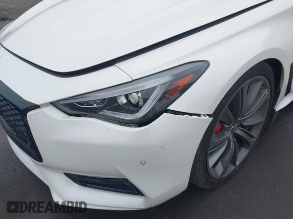 2021 Infiniti Q60 Red Sport 400 with VIN JN1FV7LK1MM530013, listed as a IAAI auction lot 41461752 with 52,844 mi miles and . Bid and sale history available at DreamBid. Image 6.
