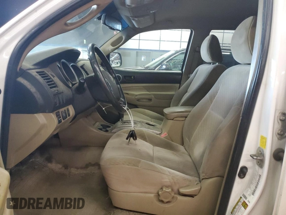 2011 Toyota Tacoma with VIN 3TMMU4FN8BM026877, listed as a Copart auction lot 65326895 with 214,919 mi miles and Clean title. Bid and sale history available at DreamBid. Image 7.