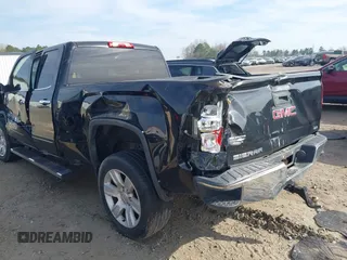 2017 GMC Sierra 1500 SLE z VIN 1GTV2MEC1HZ140821, wystawiony jako IAAI lot #41838298 z przebiegiem 98 229 mil mil oraz . Historia ofert i sprzedaży dostępna na DreamBid. Obrazek 3.