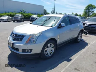 2011 Cadillac SRX Luxury Collection z VIN 3GYFNAEY9BS642724, wystawiony jako IAAI lot #42067396 z przebiegiem 177 473 mil mil oraz . Historia ofert i sprzedaży dostępna na DreamBid. Obrazek 2.