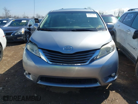 2013 Toyota Sienna XLE AAS with VIN 5TDYK3DC9DS304059, listed as a IAAI auction lot 41883196 with 170,842 mi miles and . Bid and sale history available at DreamBid. Image 13.
