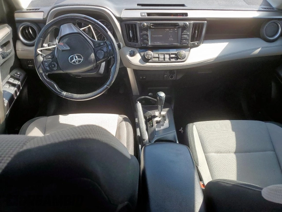 2018 Toyota RAV4 XLE with VIN JTMRFREV4JD234778, listed as a Copart auction lot 52715065 with 131,407 mi miles and Salvage Title. Bid and sale history available at carsss.com. Image 8.