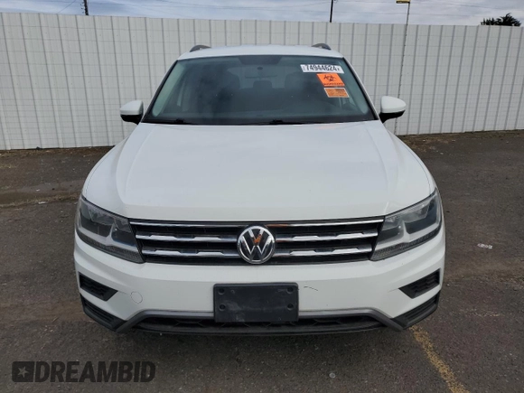 2018 Volkswagen Tiguan S with VIN 3VV0B7AX6JM111232, listed as a Copart auction lot 74944624 with 106,979 mi miles and Salvage Title. Bid and sale history available at DreamBid. Image 5.