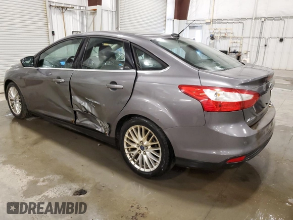 2012 Ford Focus SEL with VIN 1FAHP3H29CL386660, listed as a Copart auction lot 51447905 with 210,075 mi miles and Salvage Title. Bid and sale history available at carsss.com. Image 2.
