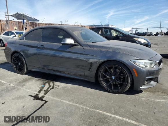 2014 BMW 4 Series 428i with VIN WBA3V7C55EP770804, listed as a Copart auction lot 79122804 with 98,890 mi miles and Salvage Title. Bid and sale history available at DreamBid. Image 4.