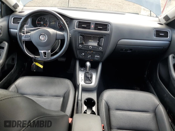 2014 Volkswagen Jetta TDI w/Premium with VIN 3VWLL7AJ6EM428743, listed as a Copart auction lot 63459355 with 145,814 mi miles and Salvage title. Bid and sale history available at DreamBid. Image 8.