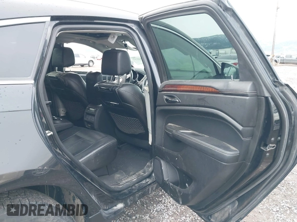 2012 Cadillac SRX Premium Collection with VIN 3GYFNFE35CS599969, listed as a IAAI auction lot 41764337 with 154,864 mi miles and . Bid and sale history available at DreamBid. Image 8.