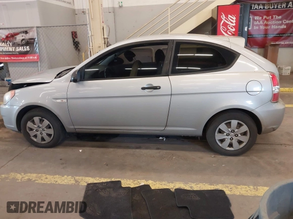 2008 Hyundai Accent GS with VIN KMHCM36C78U066341, listed as a IAAI auction lot 41377961 with 354,357 mi miles. Bid and sale history available at carsss.com. Image 14.