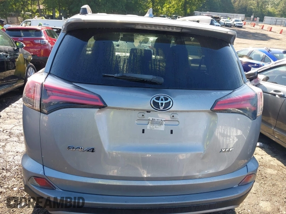 2018 Toyota RAV4 XLE with VIN 2T3WFREV6JW442859, listed as a IAAI auction lot 42252071 with 67,749 mi miles and . Bid and sale history available at DreamBid. Image 16.