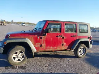 2009 Jeep Wrangler Unlimited X with VIN 1J4GZ39179L763057, listed as a IAAI auction lot 41829248 with 151,018 mi miles. Bid and sale history available at carsss.com. Image 14.
