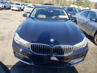 2017 BMW 7 Series 740i xDrive with VIN WBA7E4C58HGU99127, listed as a Copart auction lot 70320002 with 62,489 mi miles. Bid and sale history available at carsss.com. Image 5.