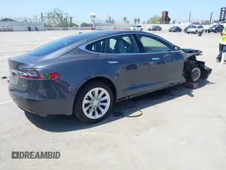 2016 Tesla Model S 90D with VIN 5YJSA1E22GF138236, listed as a IAAI auction lot 42532245 with 72,839 mi miles and . Bid and sale history available at DreamBid. Image 4.