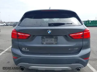 2019 BMW X1 xDrive28i with VIN WBXHT3C51K5L90571, listed as a IAAI auction lot 41909209 with 35,902 mi miles. Bid and sale history available at carsss.com. Image 16.