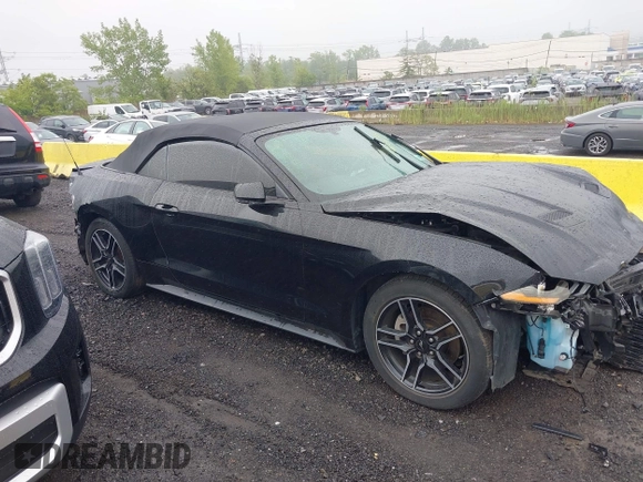 2020 Ford Mustang EcoBoost z VIN 1FATP8UH7L5131625, wystawiony jako IAAI lot #42295906 z przebiegiem 74 572 mil mil oraz . Historia ofert i sprzedaży dostępna na DreamBid. Obrazek 12.