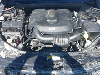 2014 Jeep Grand Cherokee Laredo with VIN 1C4RJEAG0EC580675, listed as a IAAI auction lot 41773879 with 127,714 mi miles. Bid and sale history available at carsss.com. Image 10.