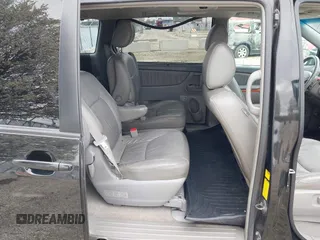 2010 Toyota Sienna XLE with VIN 5TDYK4CC1AS309856, listed as a IAAI auction lot 42089020 with 142,165 mi miles. Bid and sale history available at carsss.com. Image 8.