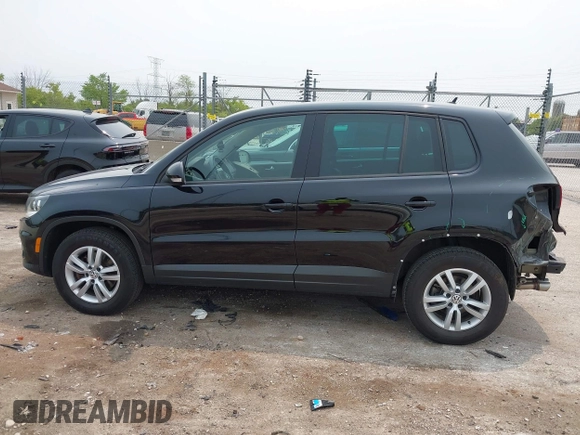 2013 Volkswagen Tiguan S with VIN WVGAV3AX2DW594334, listed as a IAAI auction lot 42405989 with 96,559 mi miles and . Bid and sale history available at DreamBid. Image 14.
