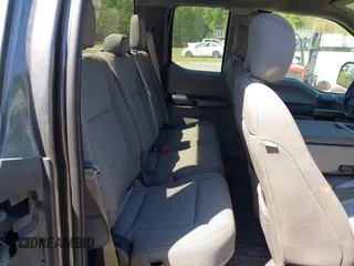 2019 Ford F-150 XL z VIN 1FTEX1C51KFA73506, wystawiony jako IAAI lot #42065274 z przebiegiem 144 397 mil mil oraz . Historia ofert i sprzedaży dostępna na DreamBid. Obrazek 8.