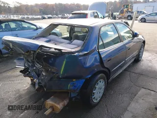2002 Honda Accord LX with VIN 1HGCG56472A019966, listed as a IAAI auction lot 40884999 with Not provided miles and . Bid and sale history available at DreamBid. Image 4.
