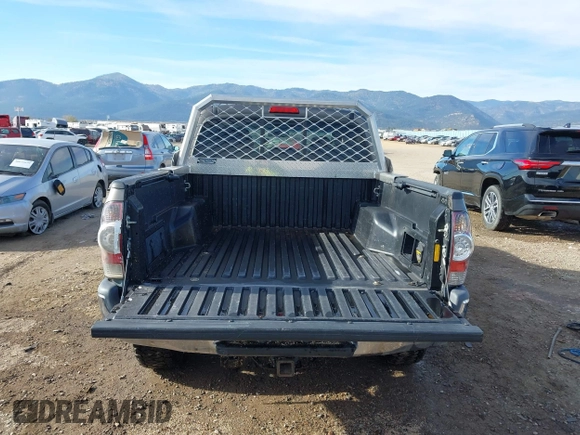 2014 Toyota Tacoma with VIN 3TMLU4EN3EM143882, listed as a IAAI auction lot 40657975 with 125,008 mi miles. Bid and sale history available at carsss.com. Image 16.