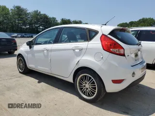 2012 Ford Fiesta SE z VIN 3FADP4EJ9CM148404, wystawiony jako Copart lot #59150695 z przebiegiem 84 705 mil mil oraz Czysty tytuł • Clean title. Historia ofert i sprzedaży dostępna na DreamBid. Obrazek 2.