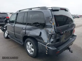 2004 Toyota Land Cruiser with VIN JTEHT05JX42059414, listed as a IAAI auction lot 41919791 with 210,528 mi miles. Bid and sale history available at carsss.com. Image 18.