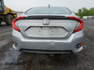 2017 Honda Civic EX-L z VIN 19XFC1F74HE209787, wystawiony jako Copart lot #56352415 z przebiegiem 130 264 mil mil oraz Szkoda całkowita • Salvage title. Historia ofert i sprzedaży dostępna na DreamBid. Obrazek 6.