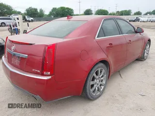 2009 Cadillac CTS RWD w/1SB with VIN 1G6DV57V390133952, listed as a IAAI auction lot 41948486 with 216,593 mi miles. Bid and sale history available at carsss.com. Image 4.