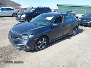 2021 Honda Civic Sedan LX with VIN 2HGFC2F66MH547284, listed as a IAAI auction lot 41811993 with 47,848 mi miles. Bid and sale history available at carsss.com. Image 2.