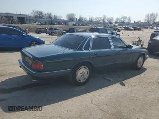 1996 Jaguar XJ z VIN SAJHX1746TC756451, wystawiony jako Copart lot #48991655 z przebiegiem 115 015 mil mil oraz Szkoda całkowita • Salvage title. Historia ofert i sprzedaży dostępna na DreamBid. Obrazek 3.