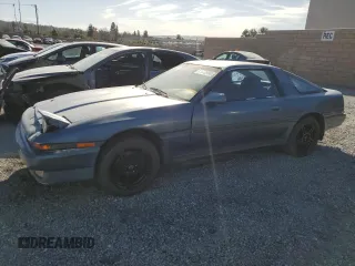 1986 Toyota Supra z VIN JT2MA70L2G0012221, wystawiony jako Copart lot #87328804 z przebiegiem 142 252 mil mil oraz Szkoda całkowita • Salvage title. Historia ofert i sprzedaży dostępna na DreamBid. Obrazek 1.