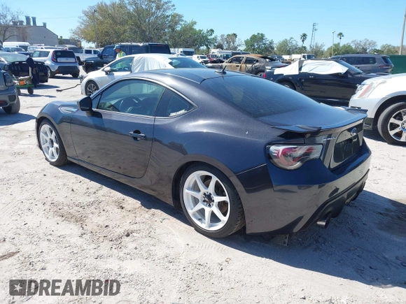 2013 Subaru BRZ Limited with VIN JF1ZCAC18D1602613, listed as a IAAI auction lot 41756384 with 136,519 mi miles. Bid and sale history available at carsss.com. Image 3.