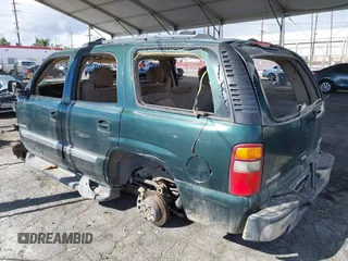 2003 GMC Yukon SLT z VIN 1GKEC13V43J304588, wystawiony jako IAAI lot #41525446 z przebiegiem Nie podano mil oraz . Historia ofert i sprzedaży dostępna na DreamBid. Obrazek 3.