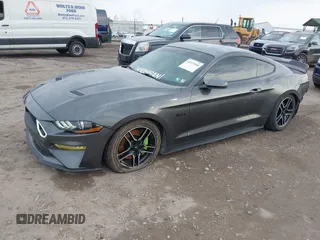 2018 Ford Mustang GT z VIN 1FA6P8CF9J5179766, wystawiony jako IAAI lot #41977000 z przebiegiem 83 608 mil mil oraz . Historia ofert i sprzedaży dostępna na DreamBid. Obrazek 18.