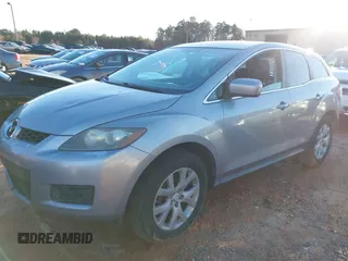 2009 Mazda CX-7 Sport with VIN JM3ER293290221298, listed as a IAAI auction lot 41067088 with 230,241 mi miles. Bid and sale history available at carsss.com. Image 2.