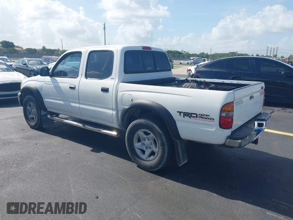 2002 Toyota Tacoma PreRunner with VIN 5TEGN92N62Z085250, listed as a IAAI auction lot 42507137 with 311,429 mi miles and . Bid and sale history available at DreamBid. Image 3.