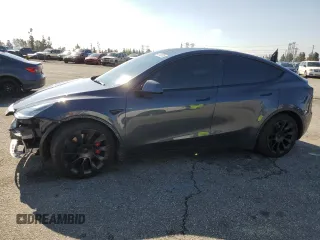 2021 Tesla Model Y Long Range z VIN 5YJYGAEE6MF244347, wystawiony jako Copart lot #48100735 z przebiegiem 29 483 mil mil oraz Szkoda całkowita • Salvage title. Historia ofert i sprzedaży dostępna na DreamBid. Obrazek 1.