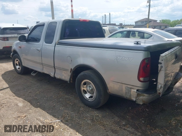 2001 Ford F-150 with VIN 2FTZX17221CB01390, listed as a IAAI auction lot 42194407 with 239,834 mi miles and . Bid and sale history available at DreamBid. Image 3.
