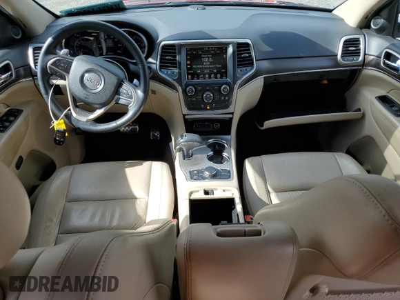 2014 Jeep Grand Cherokee Limited z VIN 1C4RJFBGXEC101022, wystawiony jako Copart lot #57526125 z przebiegiem 124 463 mil mil oraz Szkoda całkowita • Salvage title. Historia ofert i sprzedaży dostępna na DreamBid. Obrazek 8.