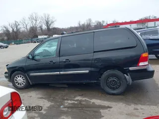 1999 Ford Windstar SE with VIN 2FMDA5243XBC41132, listed as a IAAI auction lot 41575559 with 240,497 mi miles and . Bid and sale history available at carsss.com. Image 14.