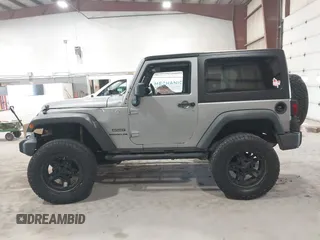 2014 Jeep Wrangler Sport with VIN 1C4AJWAG0EL173362, listed as a IAAI auction lot 42231863 with 99,321 mi miles and . Bid and sale history available at DreamBid. Image 14.