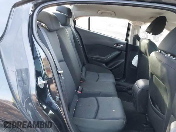 2015 Mazda 3 i SV with VIN JM1BM1T74F1246158, listed as a IAAI auction lot 41587923 with 147,001 mi miles. Bid and sale history available at carsss.com. Image 8.