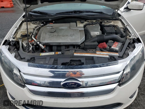 2010 Ford Fusion Hybrid with VIN 3FADP0L36AR203663, listed as a Copart auction lot 60310095 with 211,922 mi miles and Salvage title. Bid and sale history available at DreamBid. Image 11.