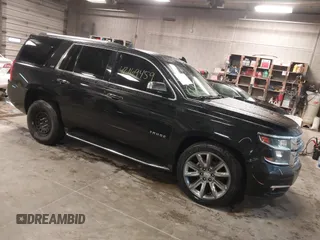 2015 Chevrolet Tahoe LTZ z VIN 1GNSKCKC3FR732016, wystawiony jako IAAI lot #42169459 z przebiegiem Nie podano mil oraz . Historia ofert i sprzedaży dostępna na DreamBid. Obrazek 1.