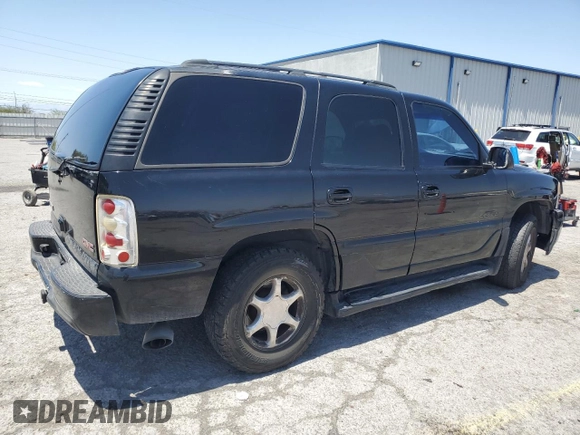 2002 GMC Yukon Denali z VIN 1GKEK63U62J241161, wystawiony jako Copart lot #58350085 z przebiegiem Nie podano mil oraz Szkoda całkowita • Salvage title. Historia ofert i sprzedaży dostępna na DreamBid. Obrazek 3.